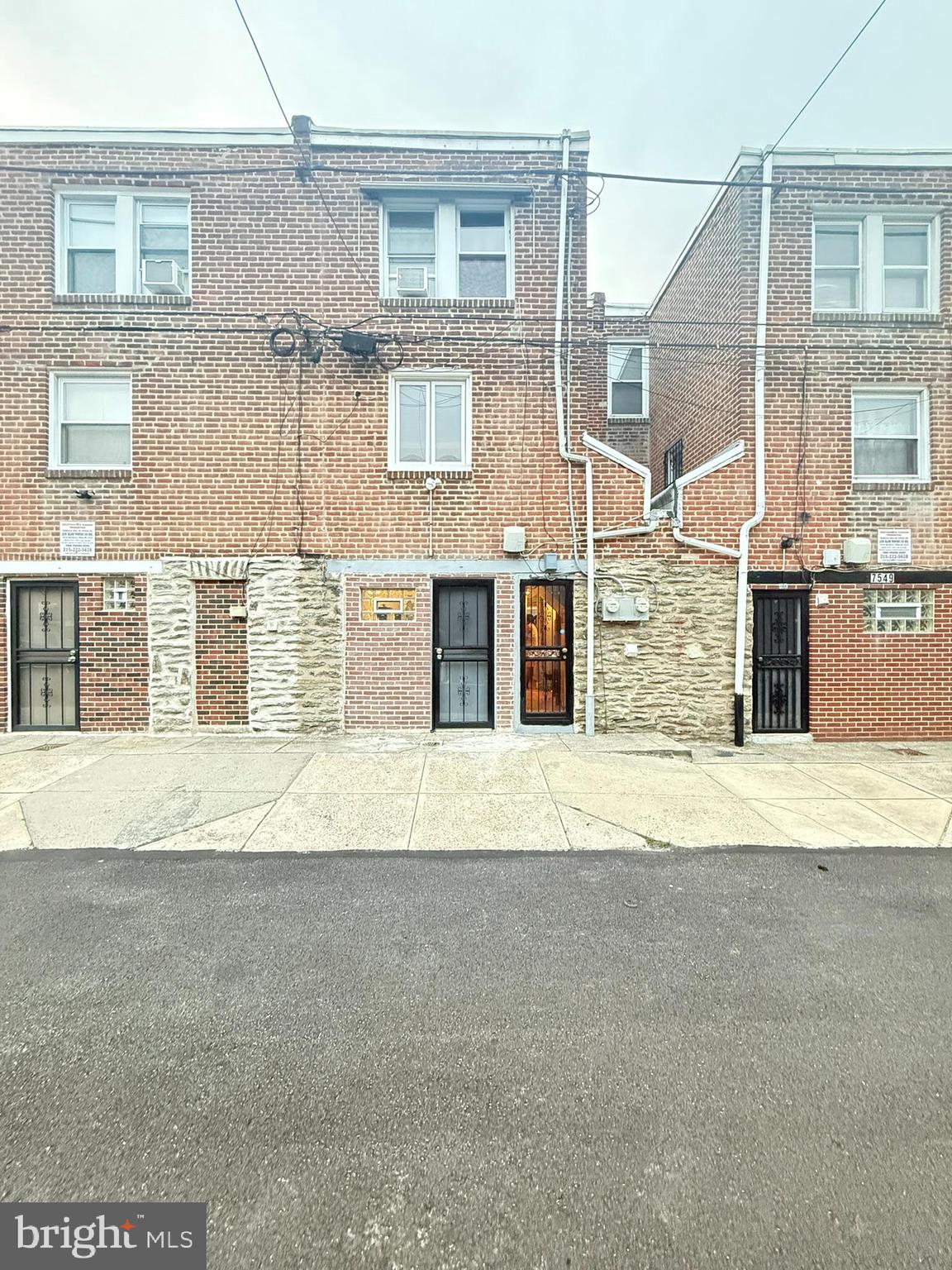 7547 Beverly Road Philadelphia, PA 19138 - Photo 30 of 32 a front view of a house with a road