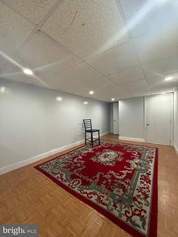 a large room with a rug