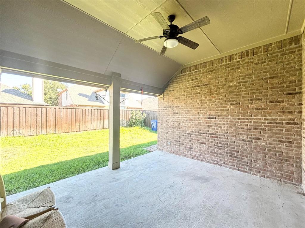 9416 Harrell Drive McKinney, TX 75072 - Photo 15 of 16 a view of an empty room and floor to ceiling window