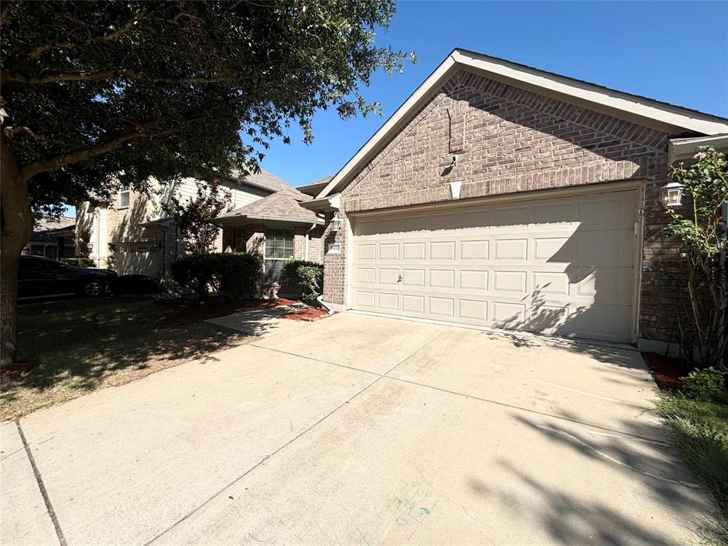 9416 Harrell Drive McKinney, TX 75072 - Photo 2 of 16 a view of house with a yard