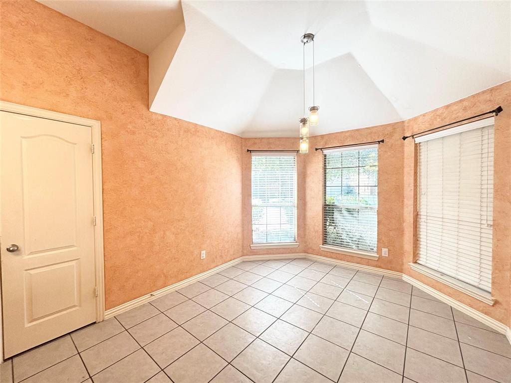 9416 Harrell Drive McKinney, TX 75072 - Photo 5 of 16 a view of an empty room with a window