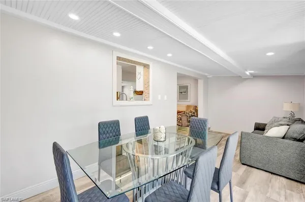 a view of a dining room with furniture