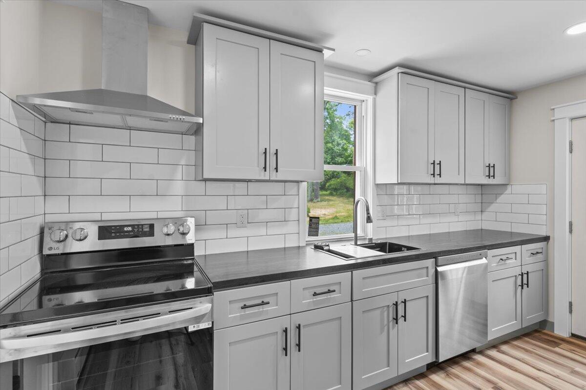 15 Locust Ridge Road Thornhurst, PA 18424 - Photo 23 of 48 a kitchen with appliances a sink and cabinets