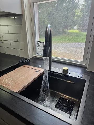 a close view of sink and microwave