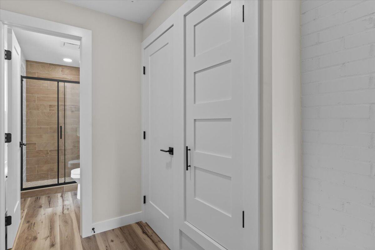 15 Locust Ridge Road Thornhurst, PA 18424 - Photo 39 of 48 a view of a hallway with wooden floor and closet area