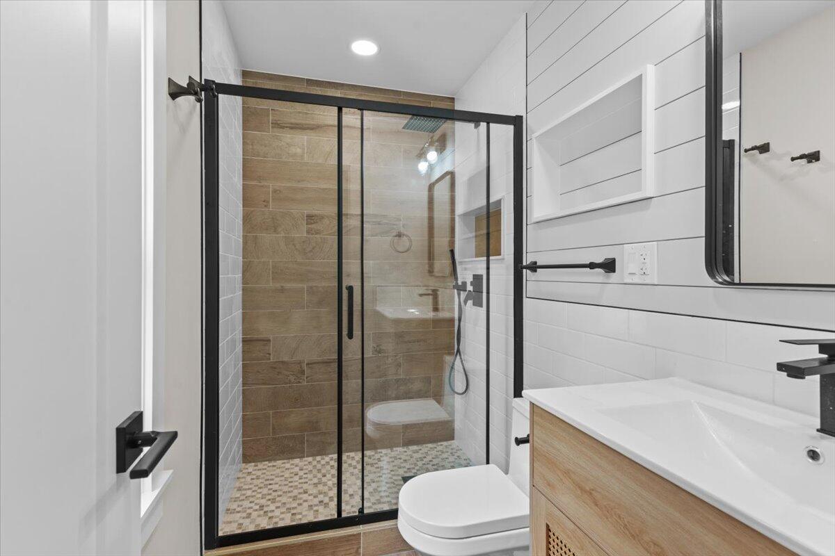 15 Locust Ridge Road Thornhurst, PA 18424 - Photo 41 of 48 a bathroom with a sink toilet and shower