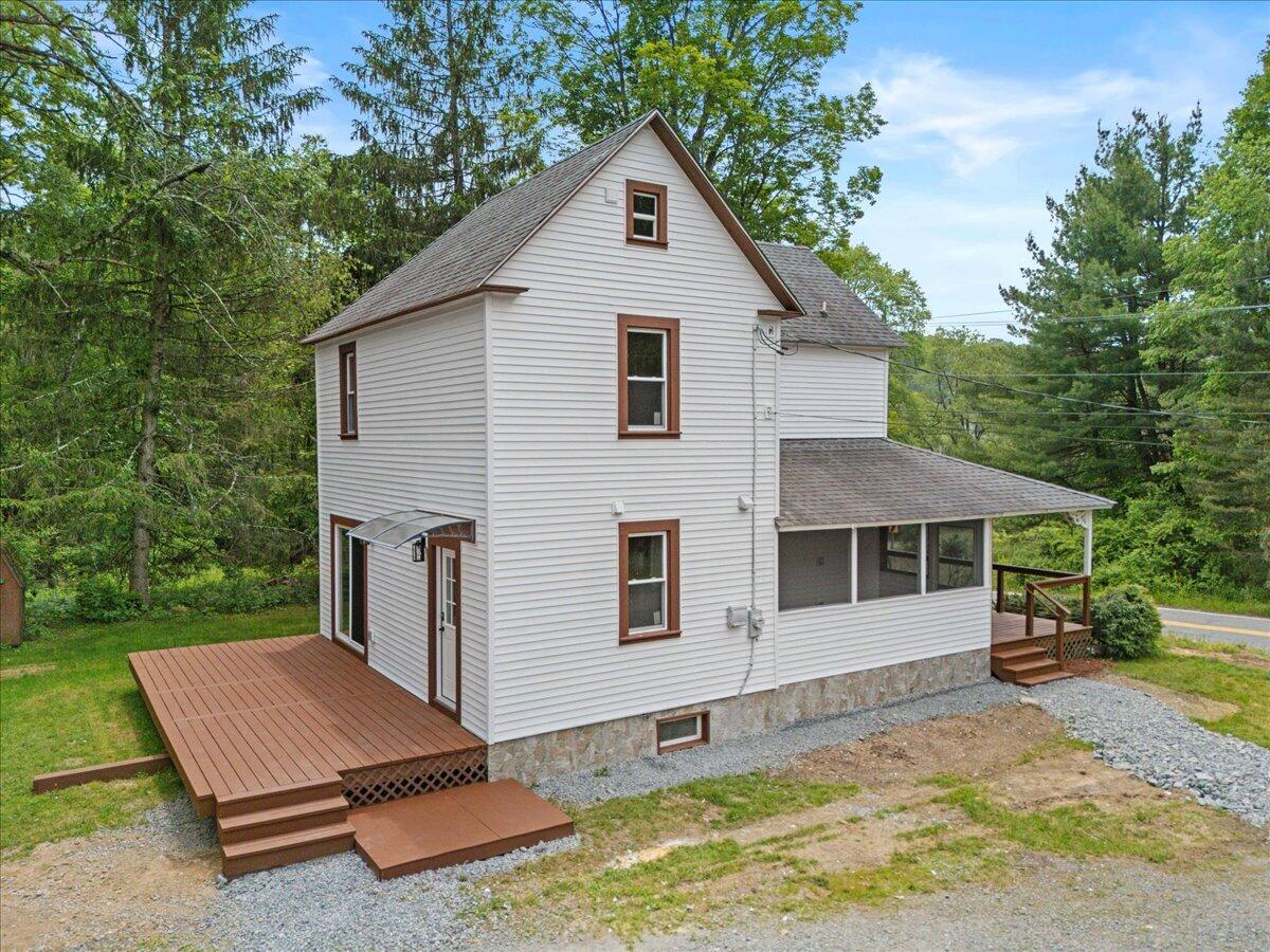 15 Locust Ridge Road Thornhurst, PA 18424 - Photo 5 of 48 a view of a house with a yard and large tree