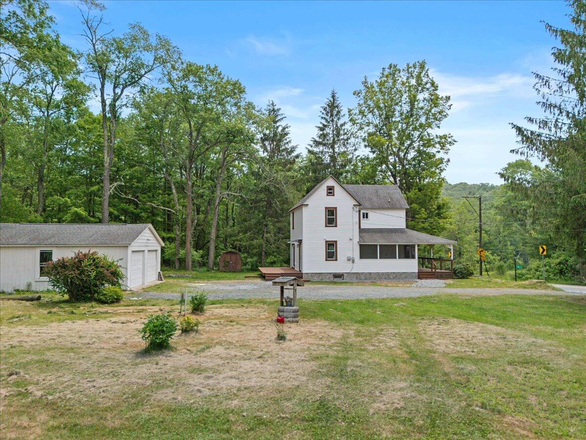 15 Locust Ridge Road Thornhurst, PA 18424 - Photo 6 of 48 a view of a house with a yard