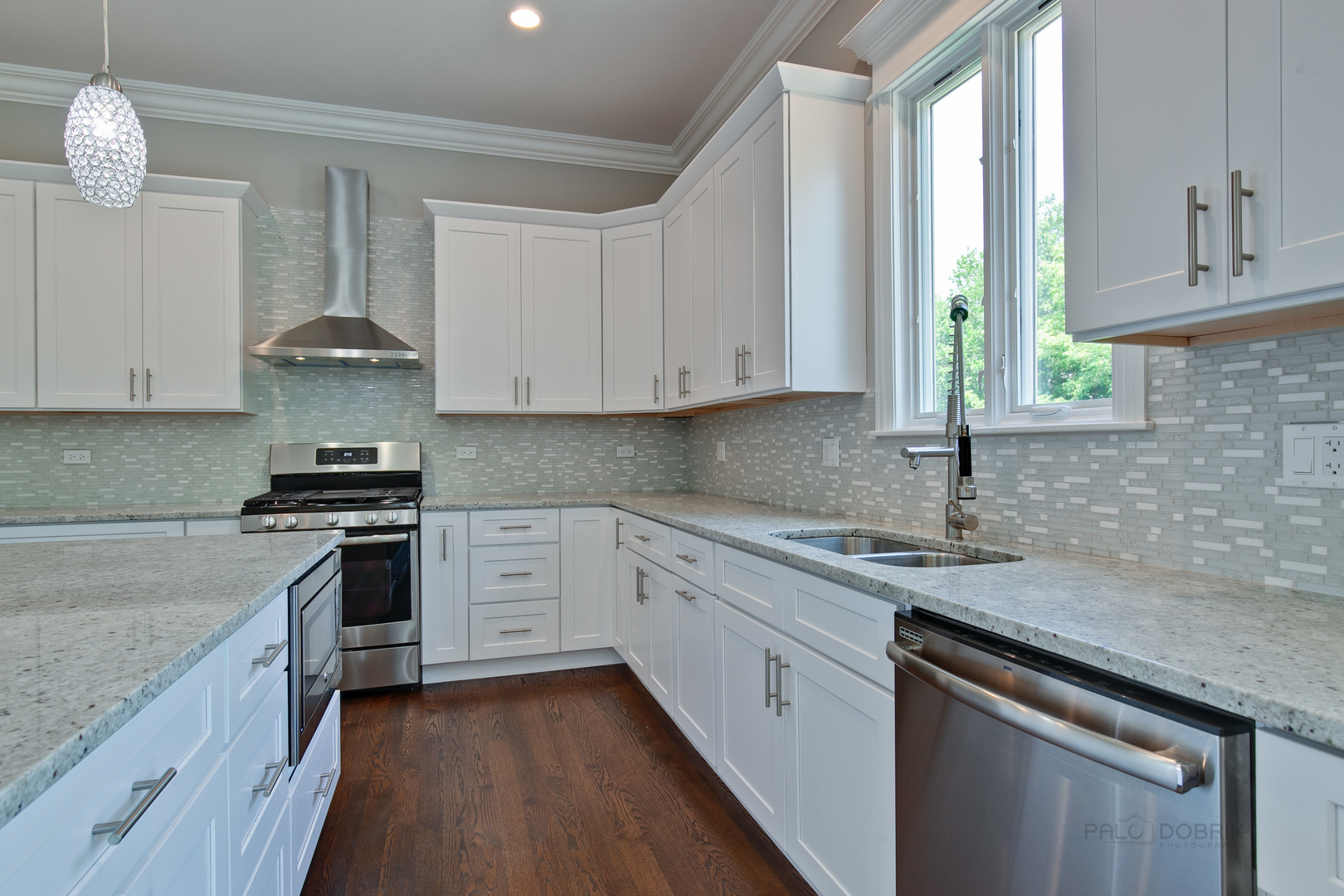 1747 Greenwood Road Glenview, IL 60026 - Photo 14 of 46 a kitchen with granite countertop white cabinets and a stove