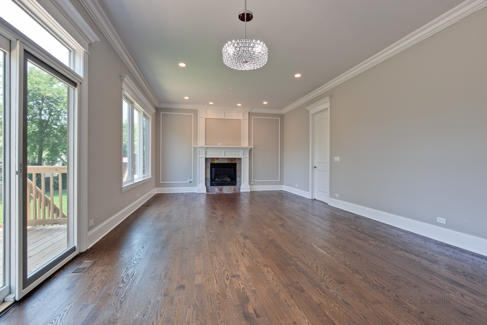 1747 Greenwood Road Glenview, IL 60026 - Photo 17 of 46 a view of an empty room with wooden floor and a window