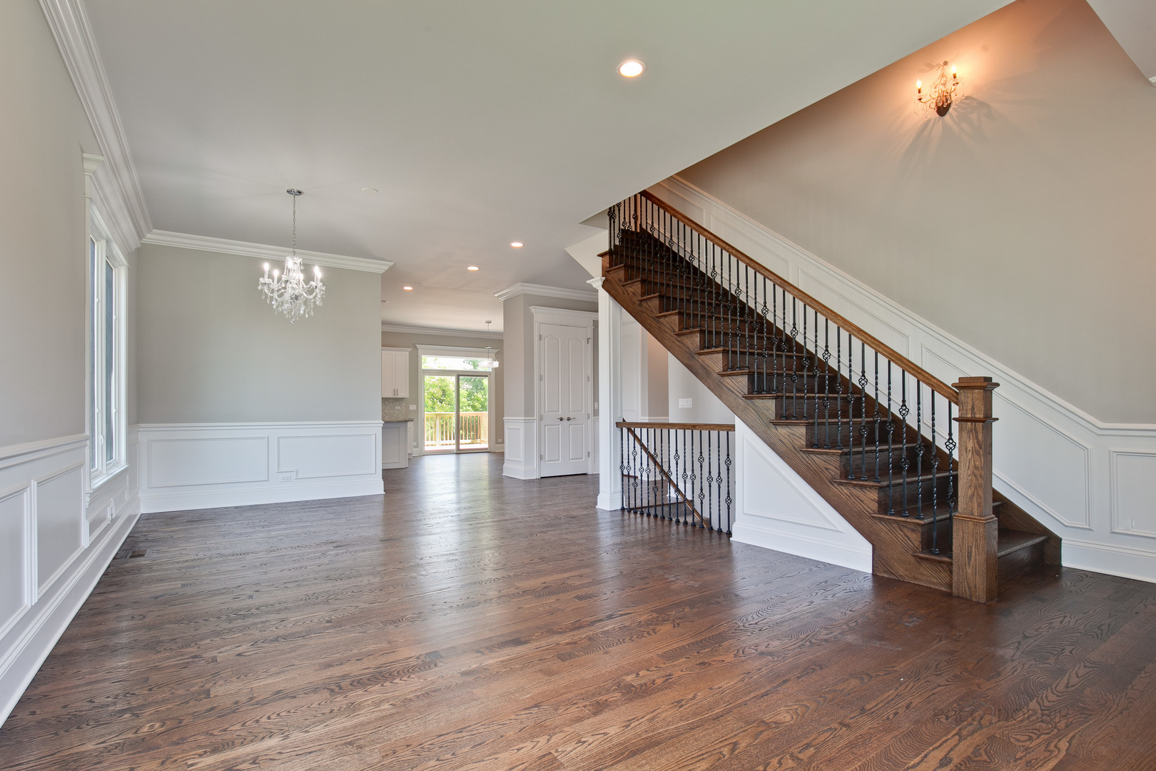 1747 Greenwood Road Glenview, IL 60026 - Photo 3 of 46 a view of staircase and kitchen with wooden floor