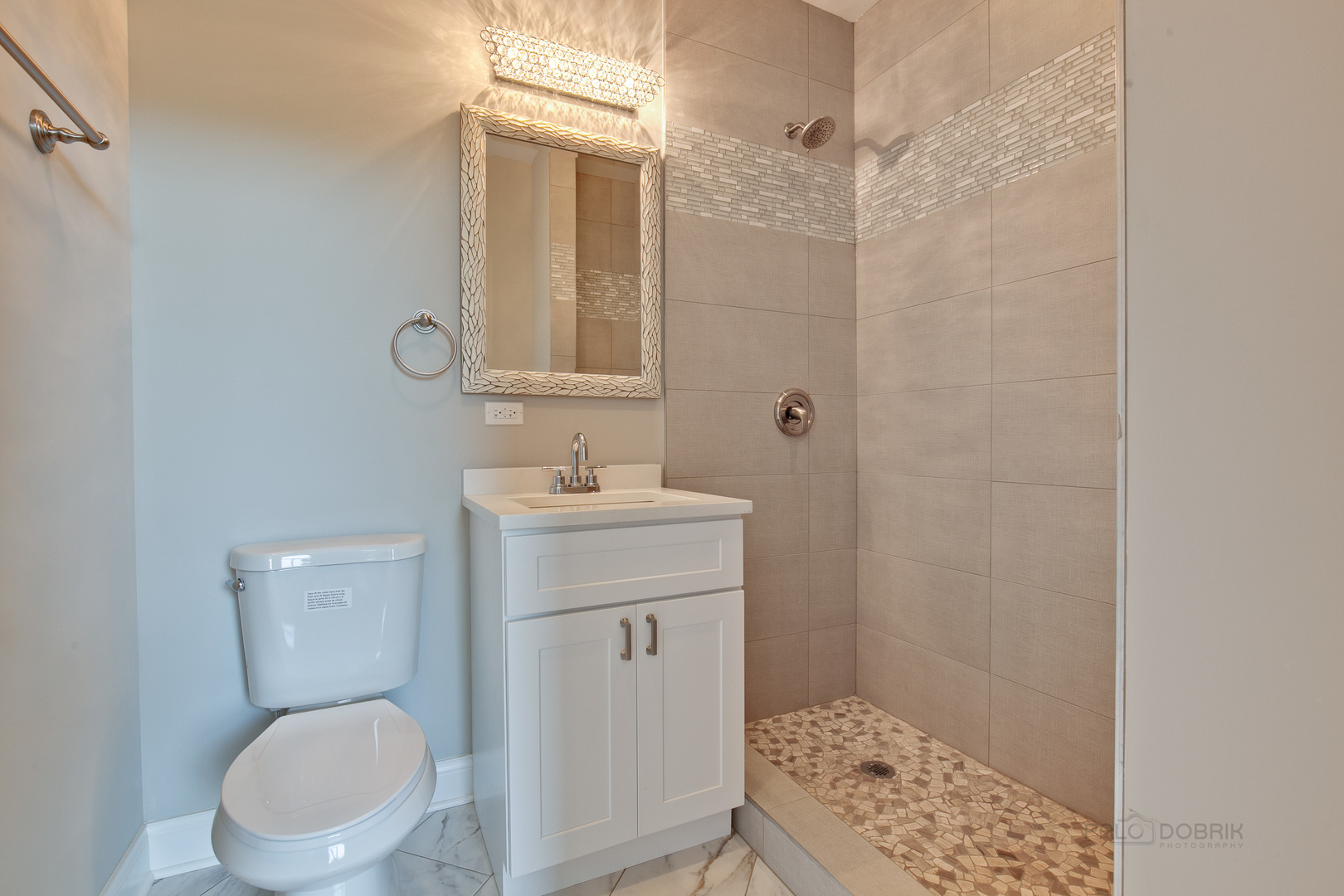 1747 Greenwood Road Glenview, IL 60026 - Photo 34 of 46 a bathroom with a sink a toilet and shower