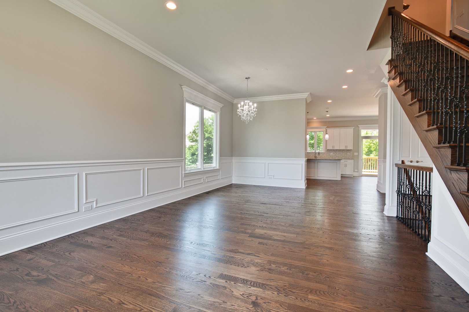 1747 Greenwood Road Glenview, IL 60026 - Photo 8 of 46 an empty room with wooden floor and windows