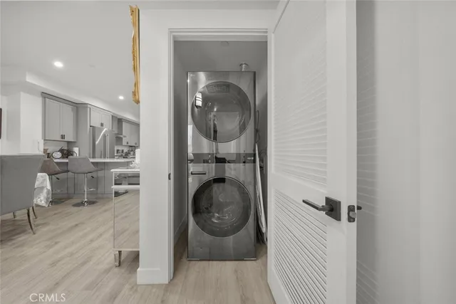 a bedroom with a bed and a tv on table