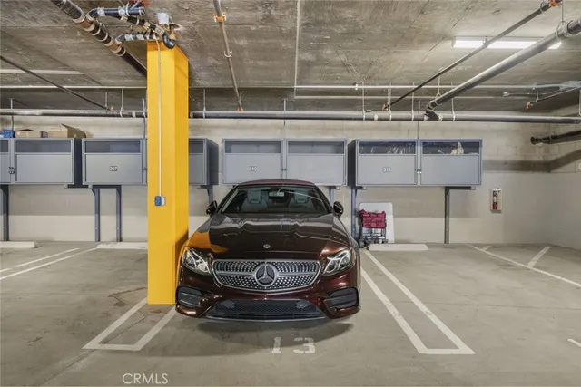 a view of parking garage with or car parked