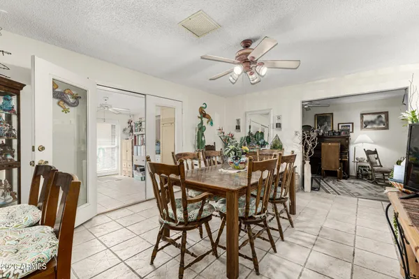 a view of a dining room with furniture