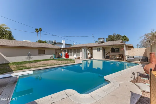 a view of a house with a swimming pool