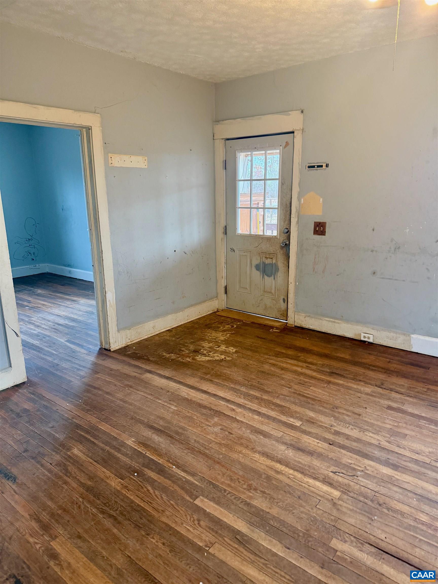 3127 Courthouse Road Palmyra, VA 22963 - Photo 8 of 16 an empty room with wooden floor and windows