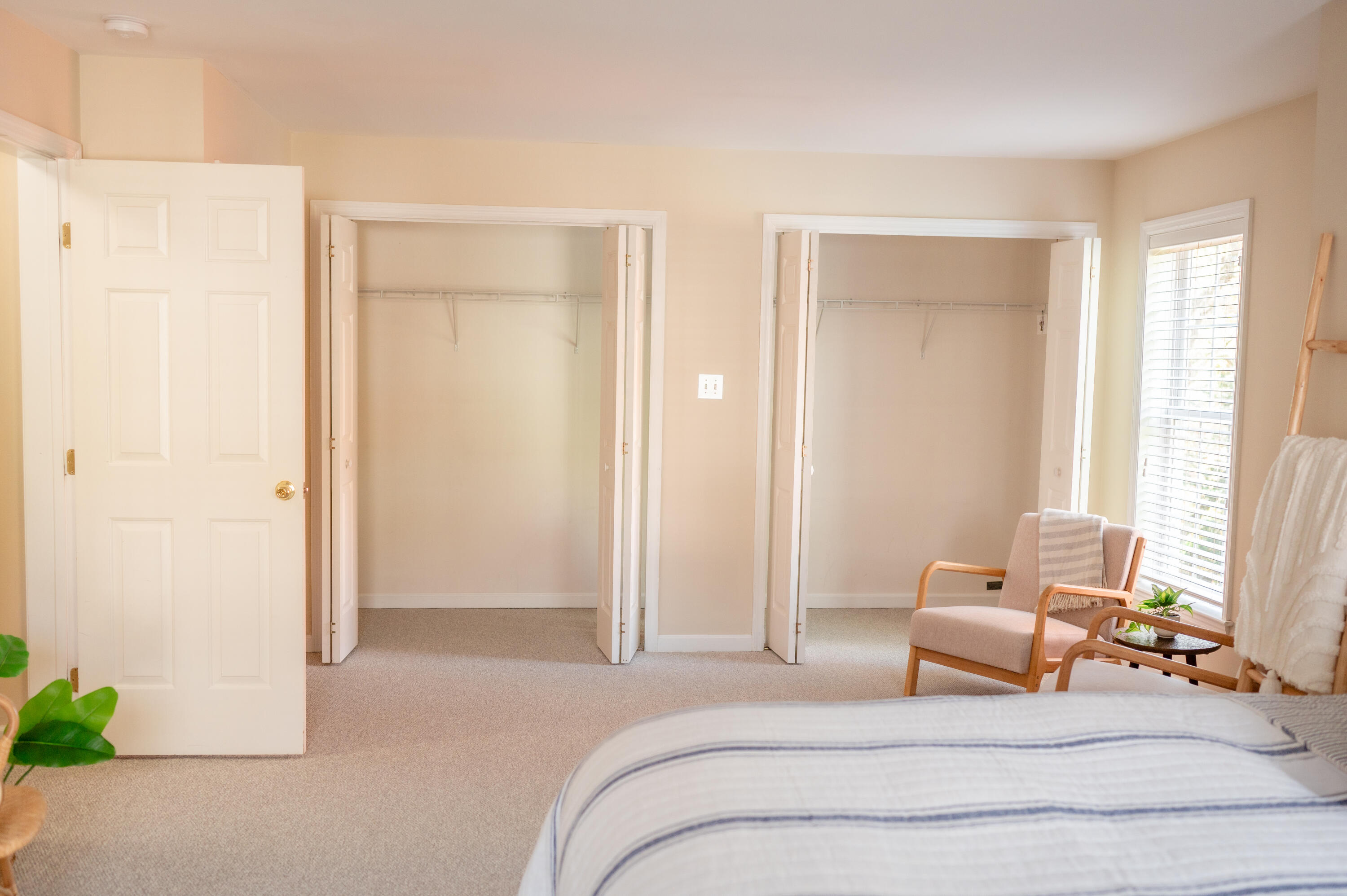 208 Irenes Way Tisbury, MA 02568 - Photo 27 of 70 a spacious bedroom with a bed and window