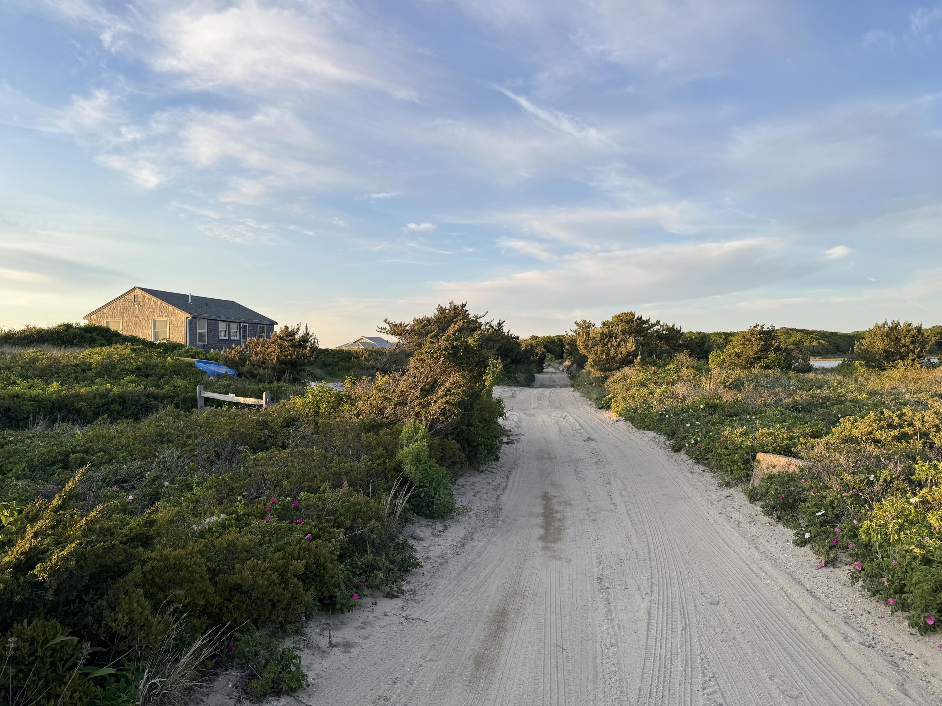 208 Irenes Way Tisbury, MA 02568 - Photo 57 of 70 a view of a road with an ocean view