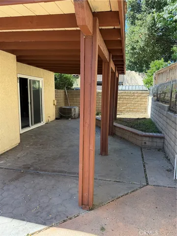 a view of a living room and window