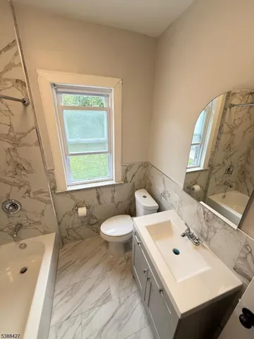 a bathroom with a sink and a bathtub