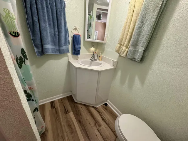 a bathroom with sink and mirror