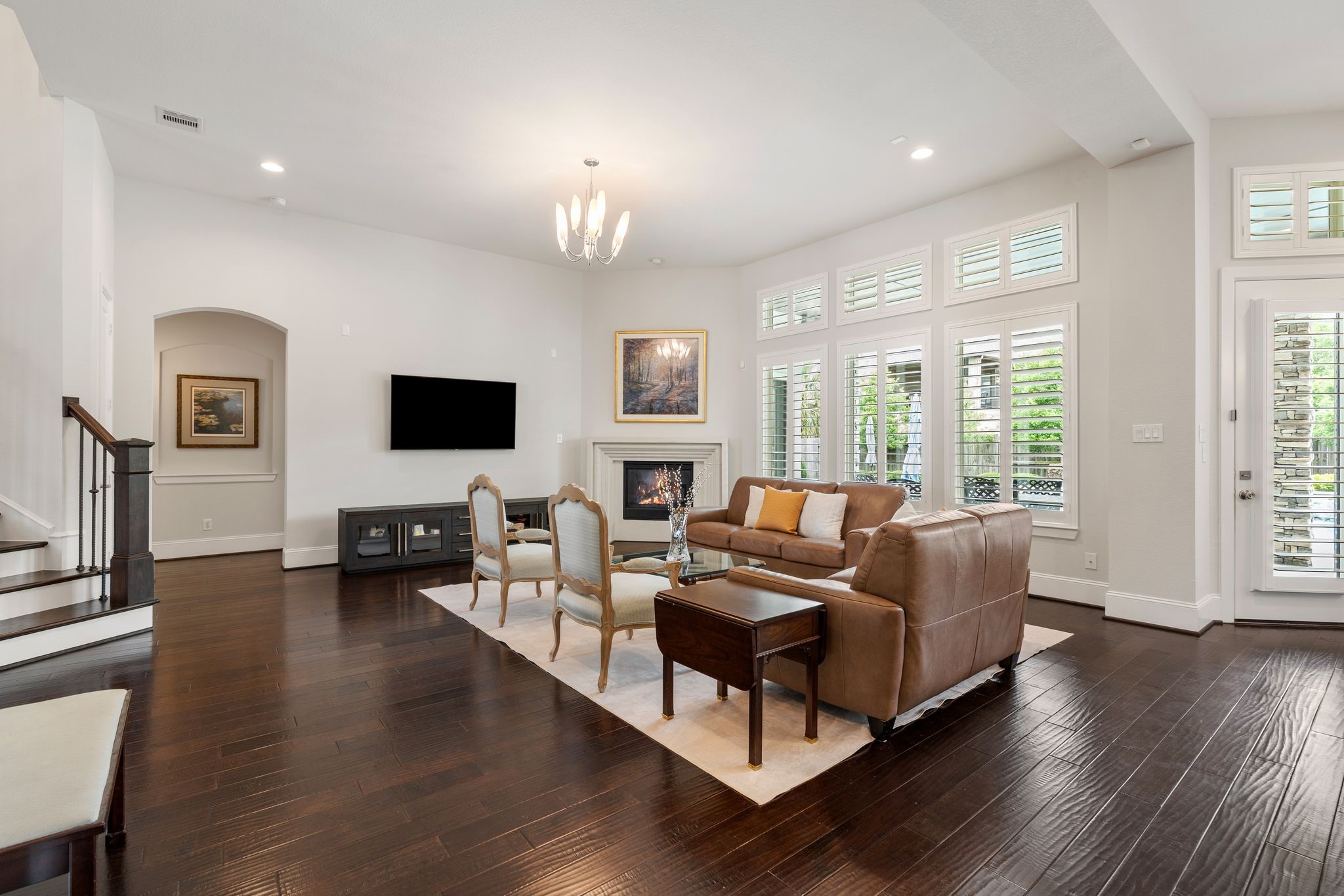 2926 Fairmont Ridge Lane Katy, TX 77494 - Photo 15 of 49 a living room with fireplace furniture and a flat screen tv