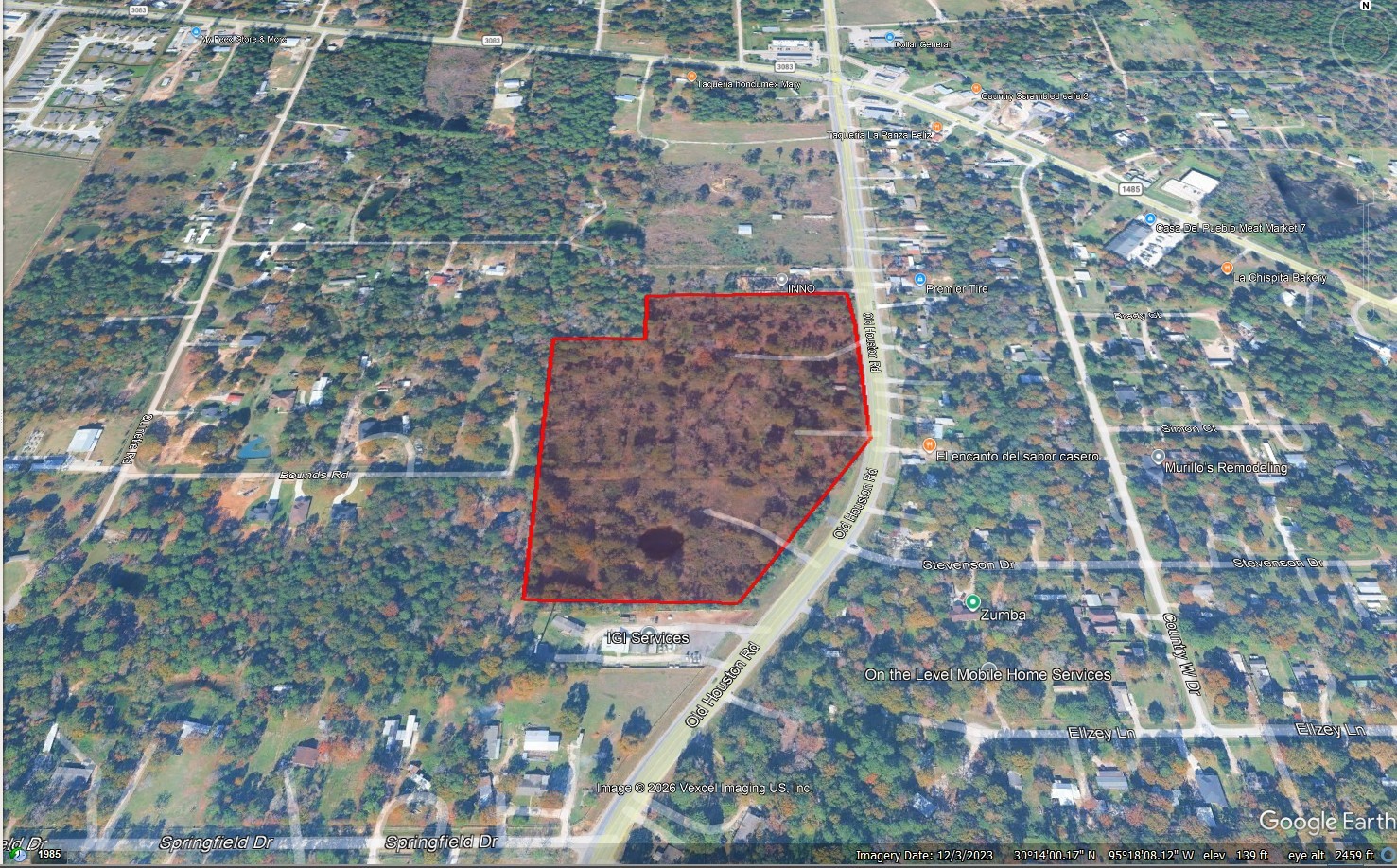 14848 Old Houston Road Conroe, TX 77302 - Photo 2 of 7 a aerial view of a multi story building