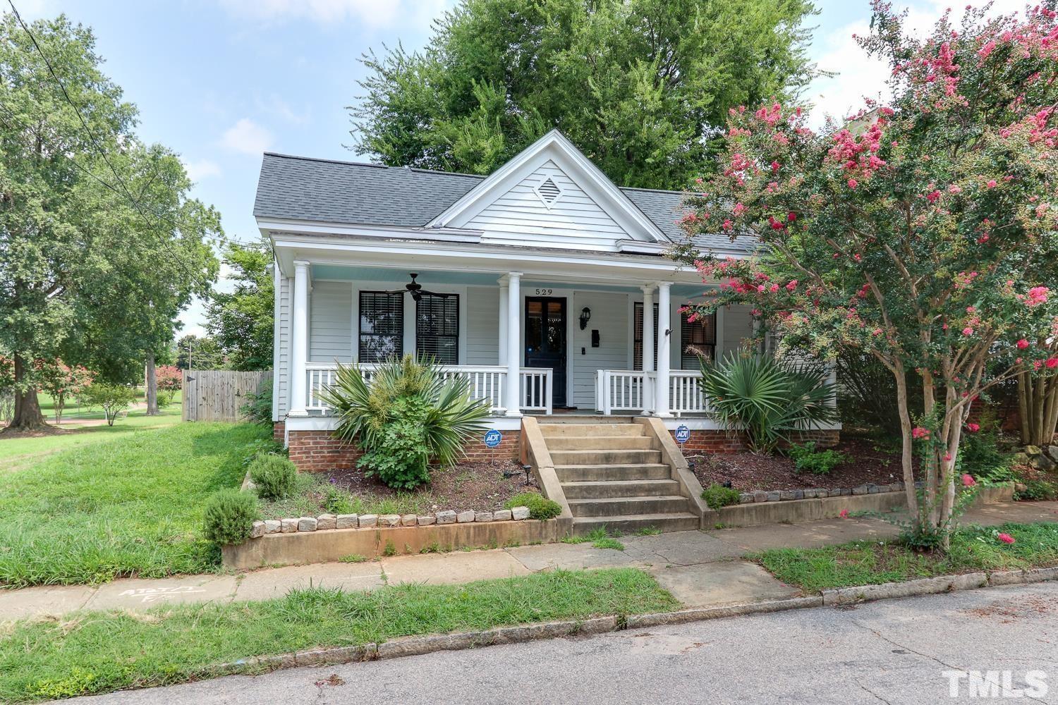 529 East Martin Street Raleigh, NC 27601 - Photo 1 of 29 a front view of a house with garden