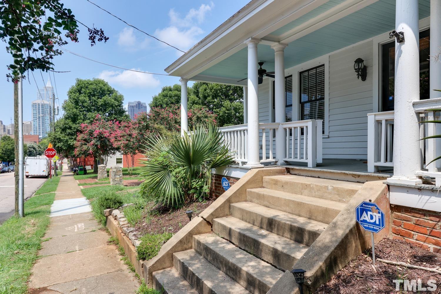 529 East Martin Street Raleigh, NC 27601 - Photo 2 of 29 a front view of a house with garden