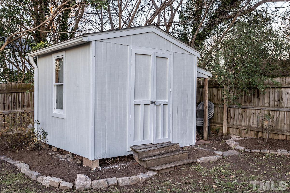 529 East Martin Street Raleigh, NC 27601 - Photo 27 of 29 a white house with a outdoor space