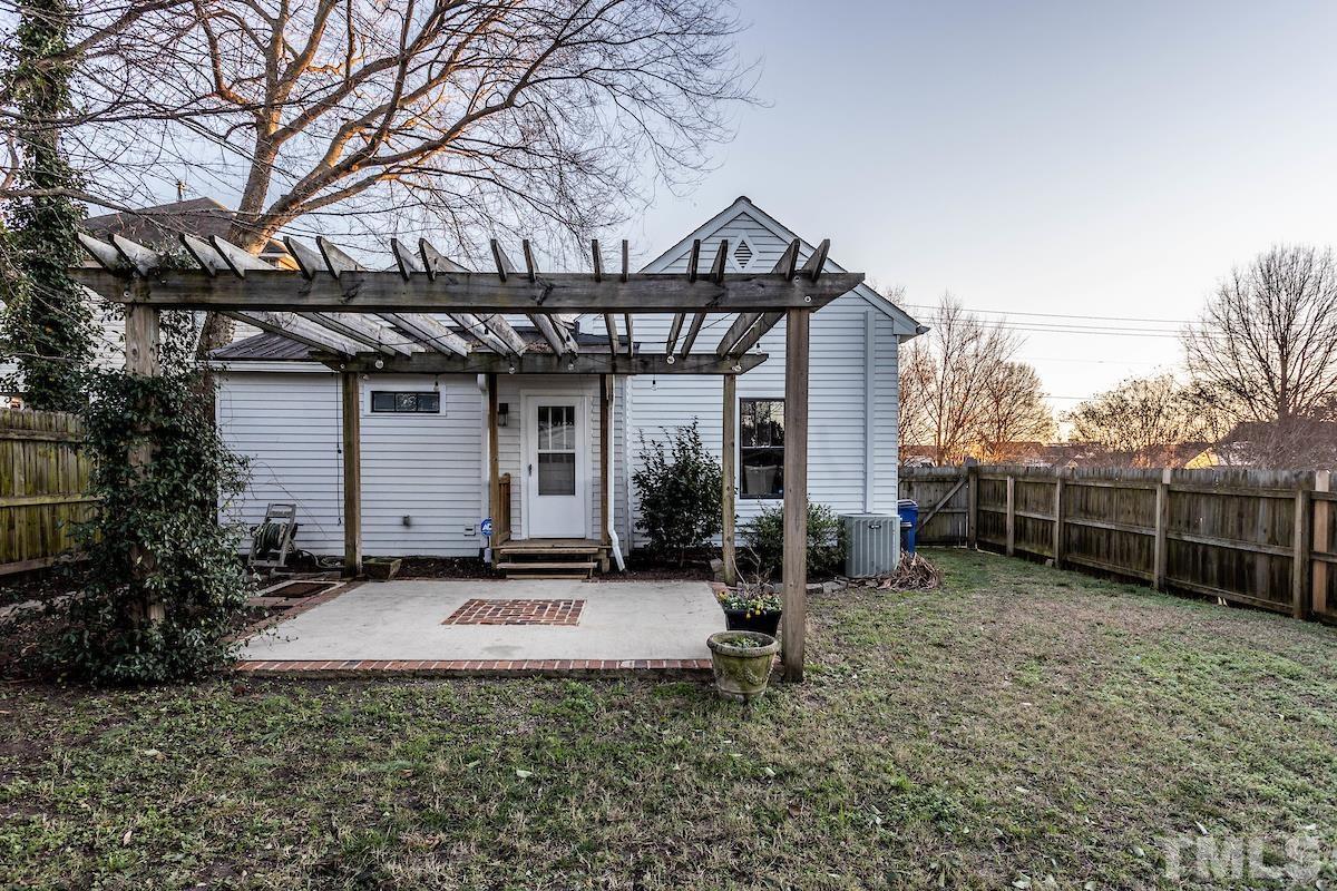 529 East Martin Street Raleigh, NC 27601 - Photo 29 of 29 a view of a house with backyard and trees
