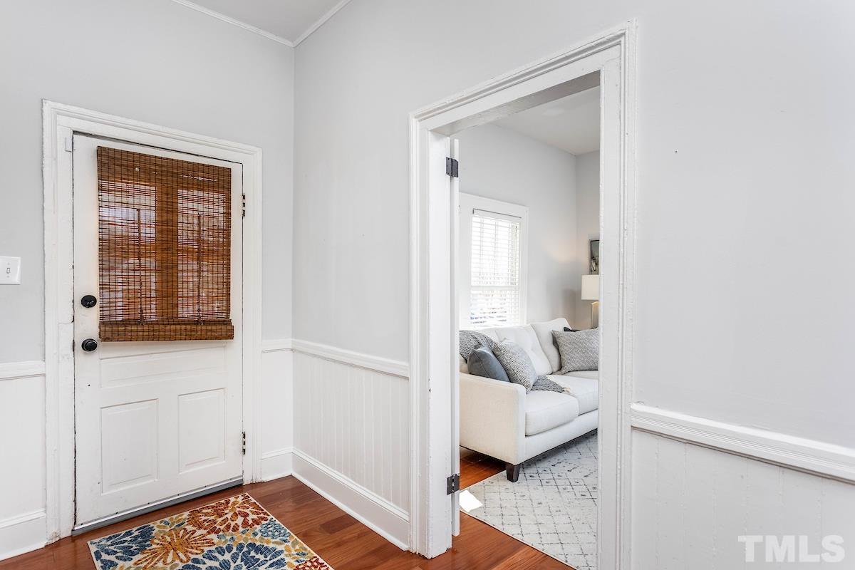 529 East Martin Street Raleigh, NC 27601 - Photo 5 of 29 a view of bedroom with furniture and wooden floor