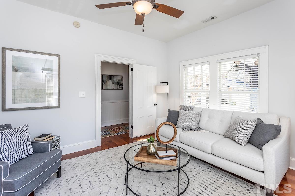 529 East Martin Street Raleigh, NC 27601 - Photo 8 of 29 a living room with furniture and a large window