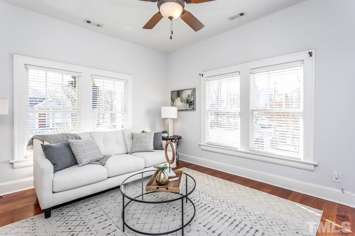 529 East Martin Street Raleigh, NC 27601 - Photo 9 of 29 a living room with furniture and a large window