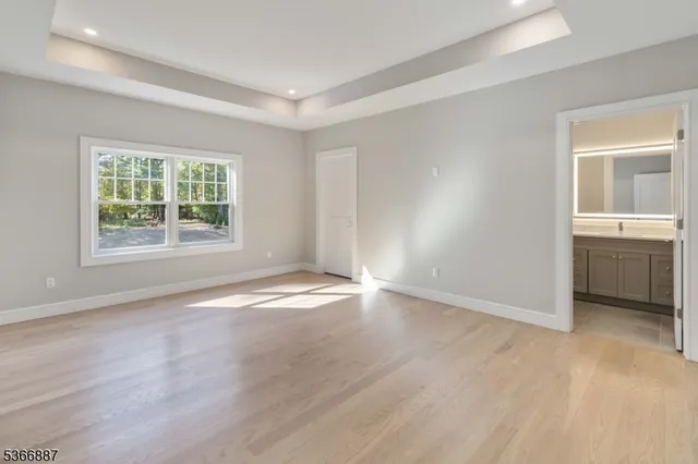 a bathroom with a shower and toilet