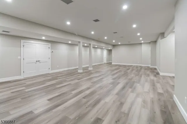 a living room with furniture pool and pool table