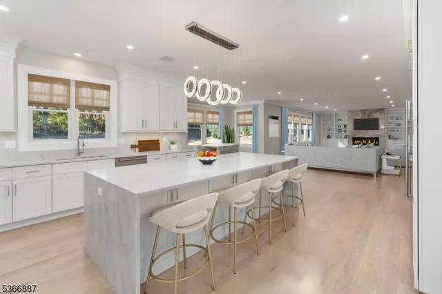 a kitchen with a sink a counter top space and appliances