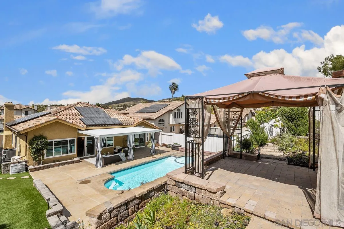 2284 Rolling Ridge Road Chula Vista, CA 91914 - Photo 32 of 44 a view of a house with backyard porch and sitting area