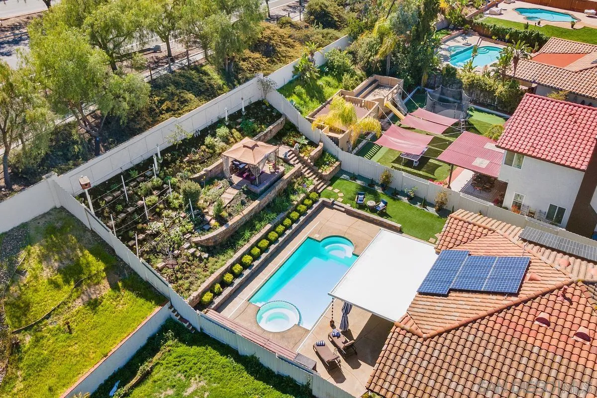 2284 Rolling Ridge Road Chula Vista, CA 91914 - Photo 36 of 44 an aerial view of a house with a garden and deck