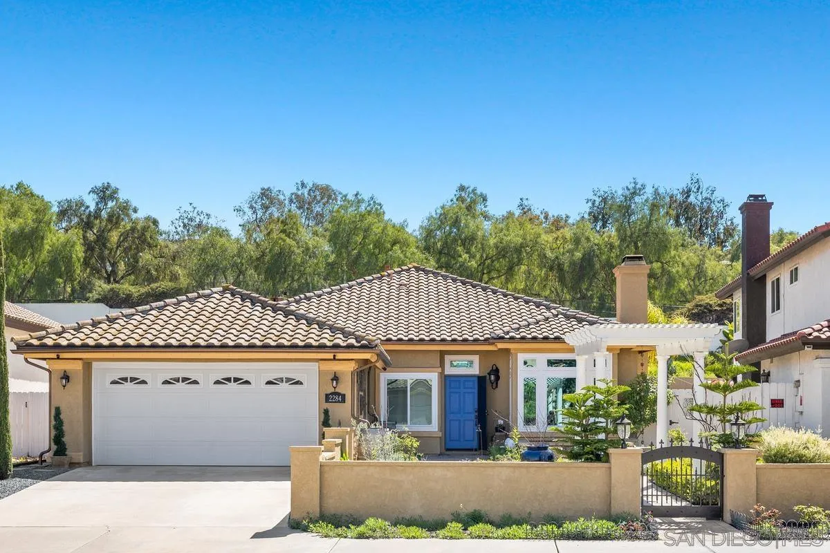 2284 Rolling Ridge Road Chula Vista, CA 91914 - Photo 42 of 44 a front view of a house with a garden
