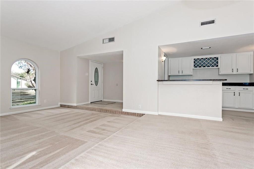 5000 Goodwin Drive Plano, TX 75023 - Photo 4 of 16 a view of an empty room with a window