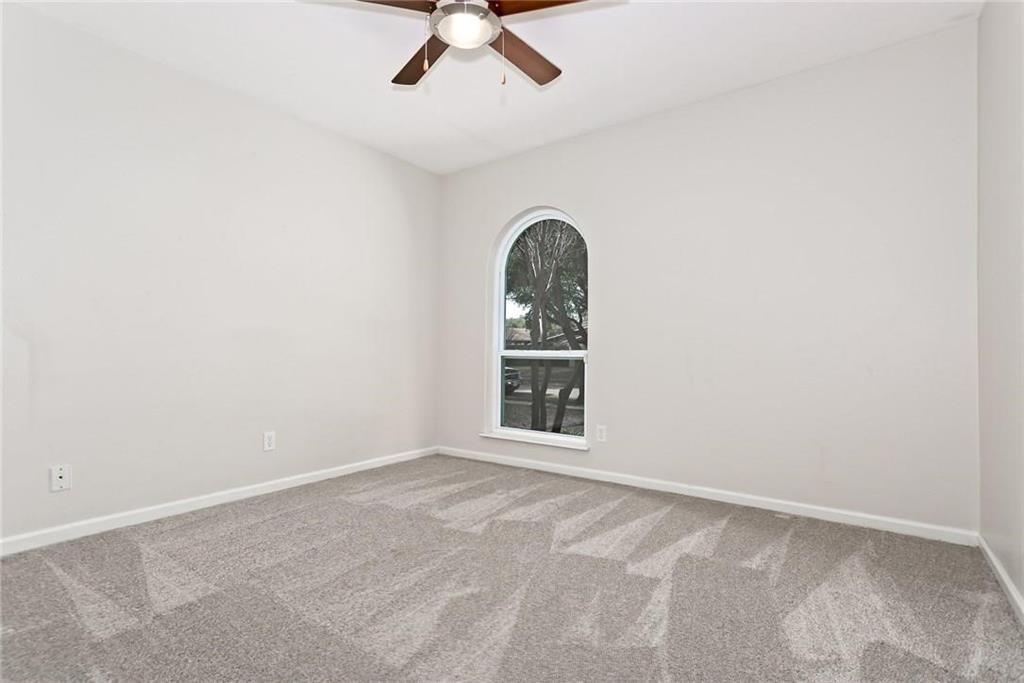 5000 Goodwin Drive Plano, TX 75023 - Photo 10 of 16 an empty room with a window