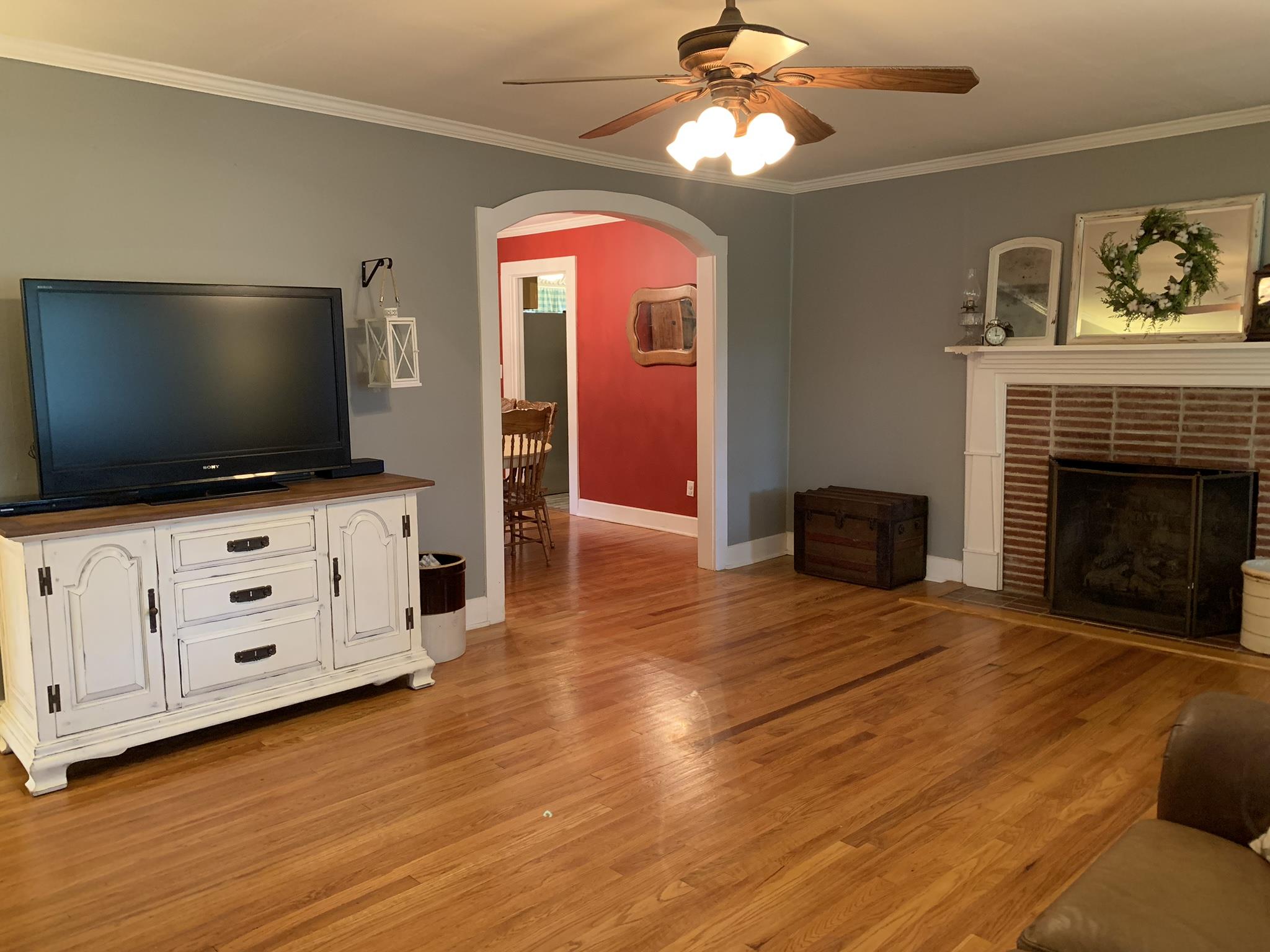 556 Central Valley Road Murfreesboro, TN 37129 - Photo 14 of 30 View of fireplace & dining room from the living room!