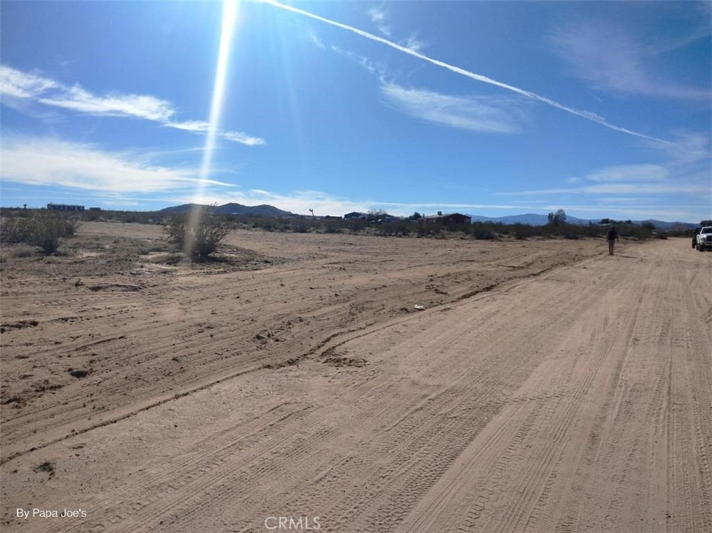 60649 Stagemans Road Landers, CA 92285 - Photo 1 of 4 a view of beach and mountain