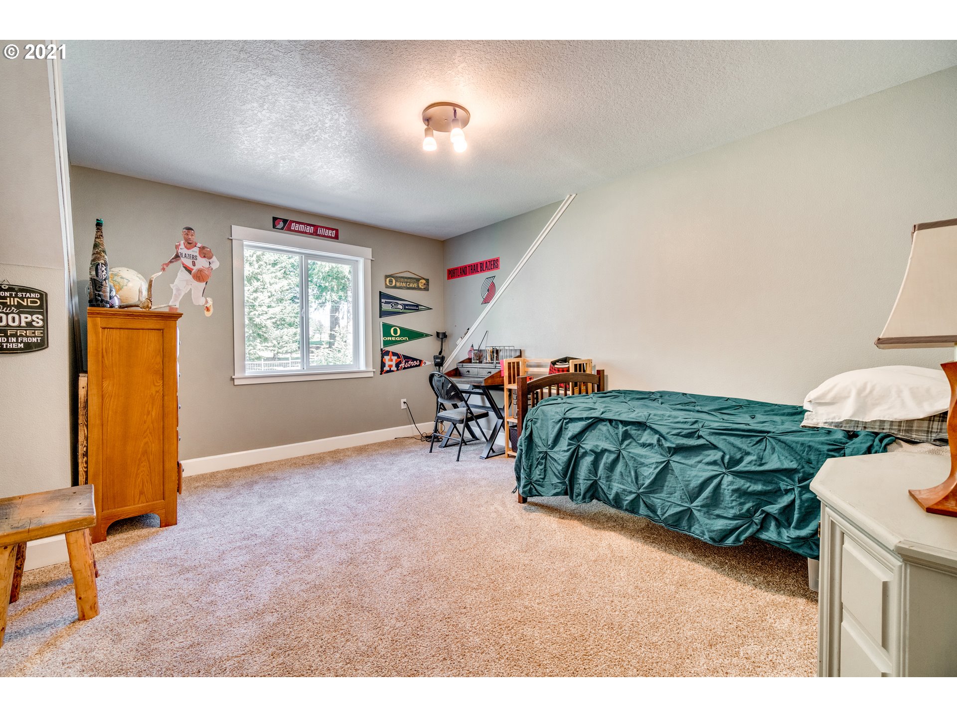 47280 Southeast Coalman Road Sandy, OR 97055 - Photo 18 of 32 a bed room with a bed and a chair