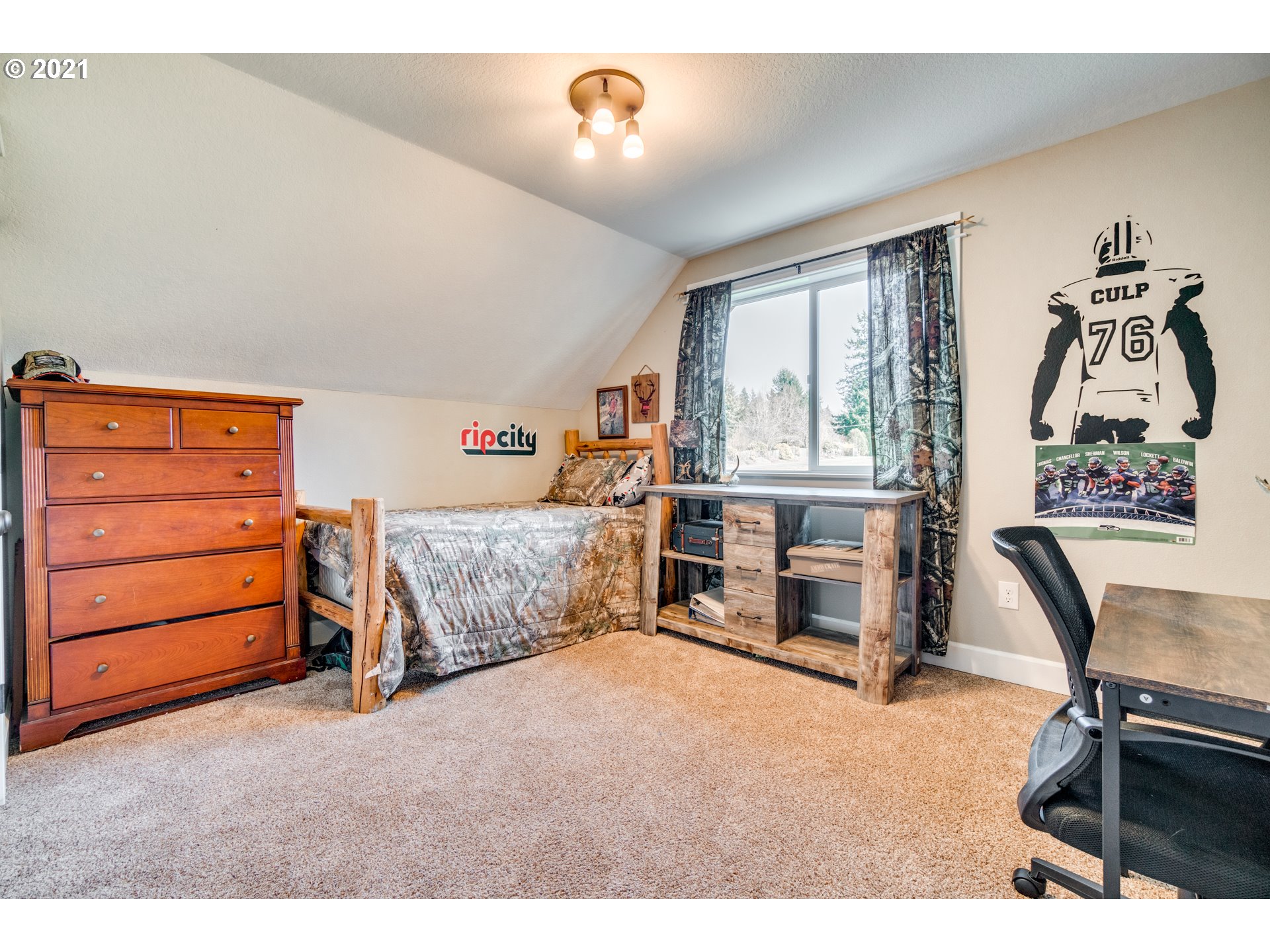 47280 Southeast Coalman Road Sandy, OR 97055 - Photo 19 of 32 a bedroom with furniture and a bed