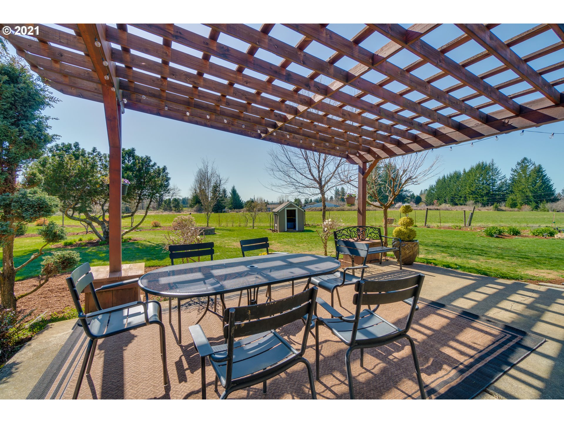 47280 Southeast Coalman Road Sandy, OR 97055 - Photo 22 of 32 a view of an outdoor sitting area with furniture and yard