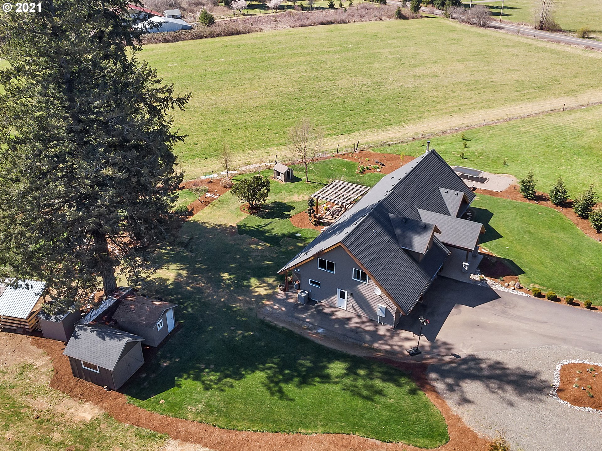 47280 Southeast Coalman Road Sandy, OR 97055 - Photo 28 of 32 an aerial view of ocean with residential house with outdoor space